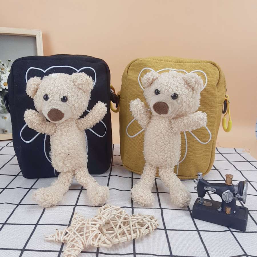 TÚI CHÉO GẤU NHỎ 1 z3406355890646 d2ad40b7381694d3a847cc39ccd40152 compressed