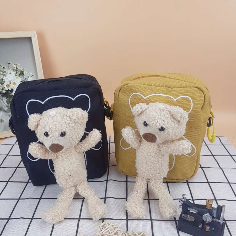 TÚI CHÉO GẤU NHỎ 3 z3406355898759 6b09a98a1fd69dbfe560fa95c8a14b4e compressed